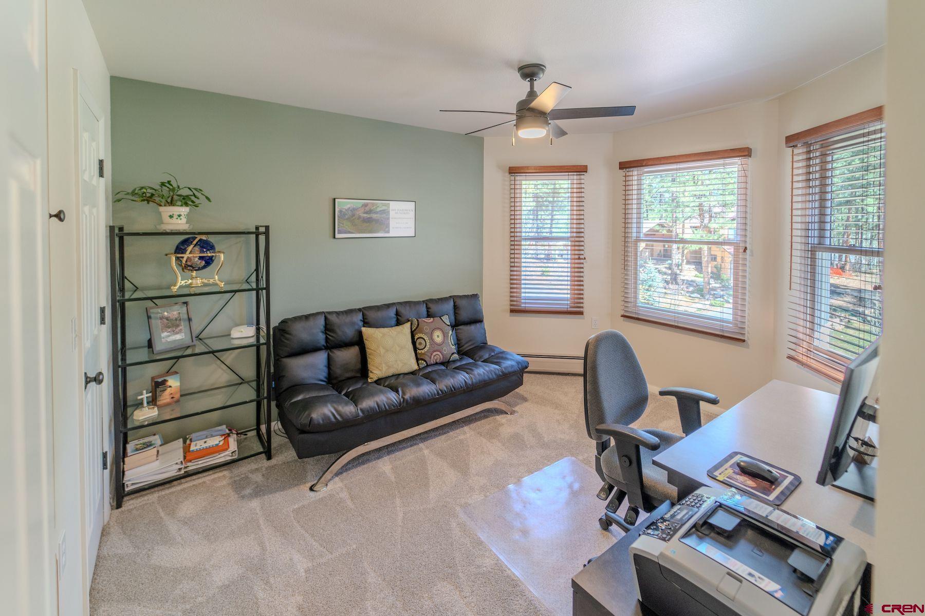 34 Crocus Court Durango, CO 81301 - Photo 20 of 30 a living room with furniture