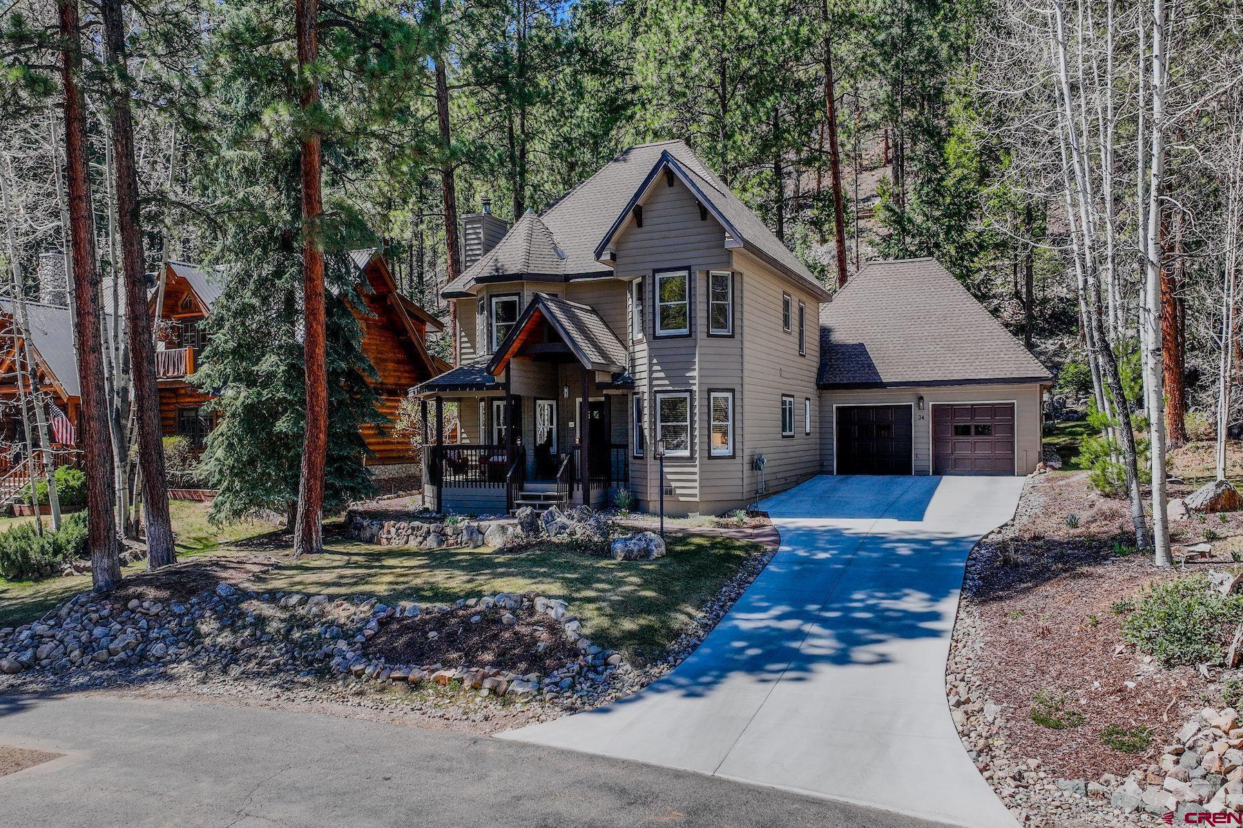 34 Crocus Court Durango, CO 81301 - Photo 30 of 30 a front view of a house with garden