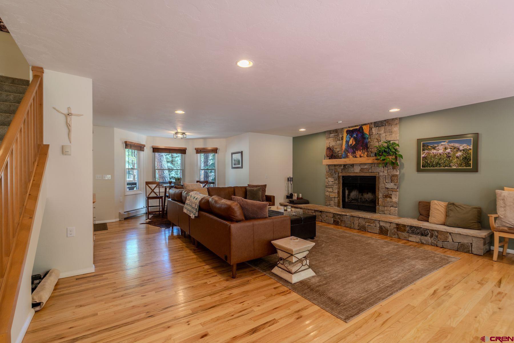 34 Crocus Court Durango, CO 81301 - Photo 4 of 30 a living room with furniture and a fireplace