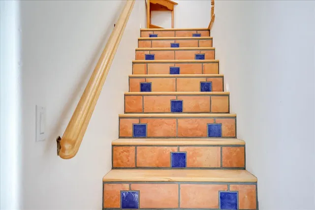 a bathroom with a shower and a sink