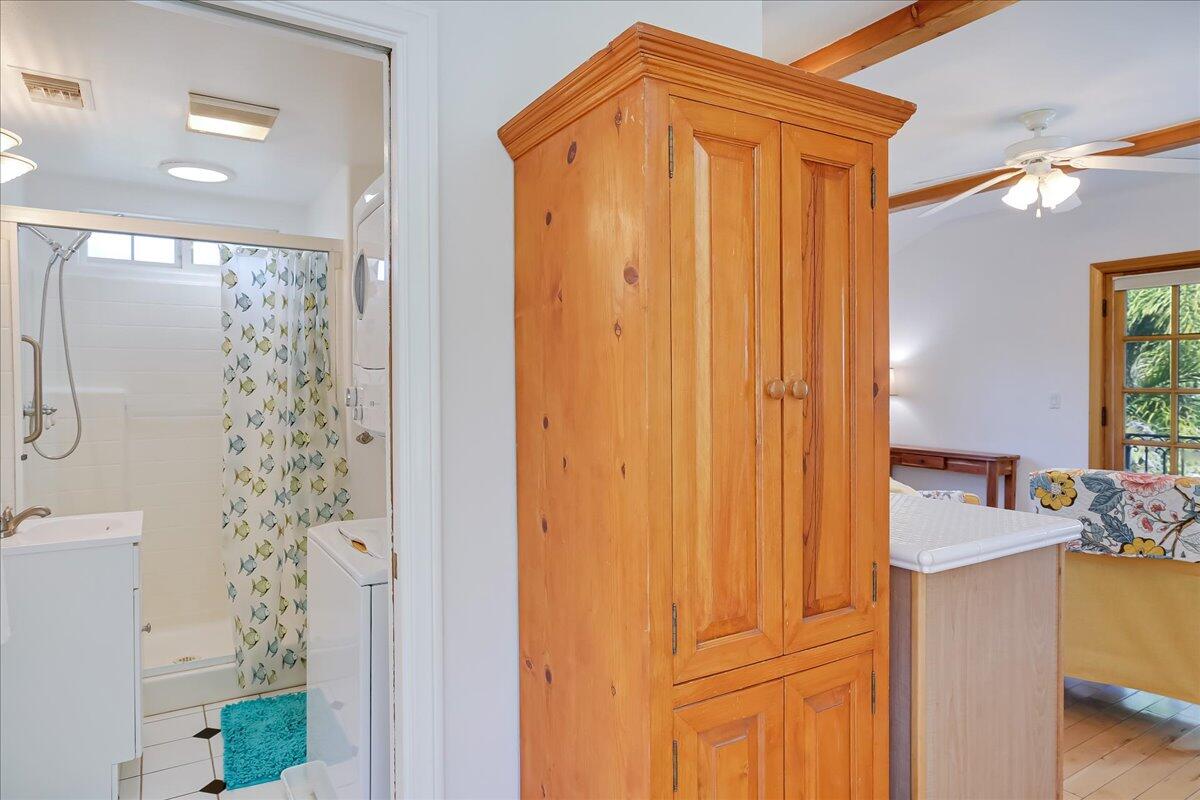 0 Mountain Avenue Santa Barbara, CA 93101 - Photo 21 of 24 a bathroom with a shower curtain and a sink