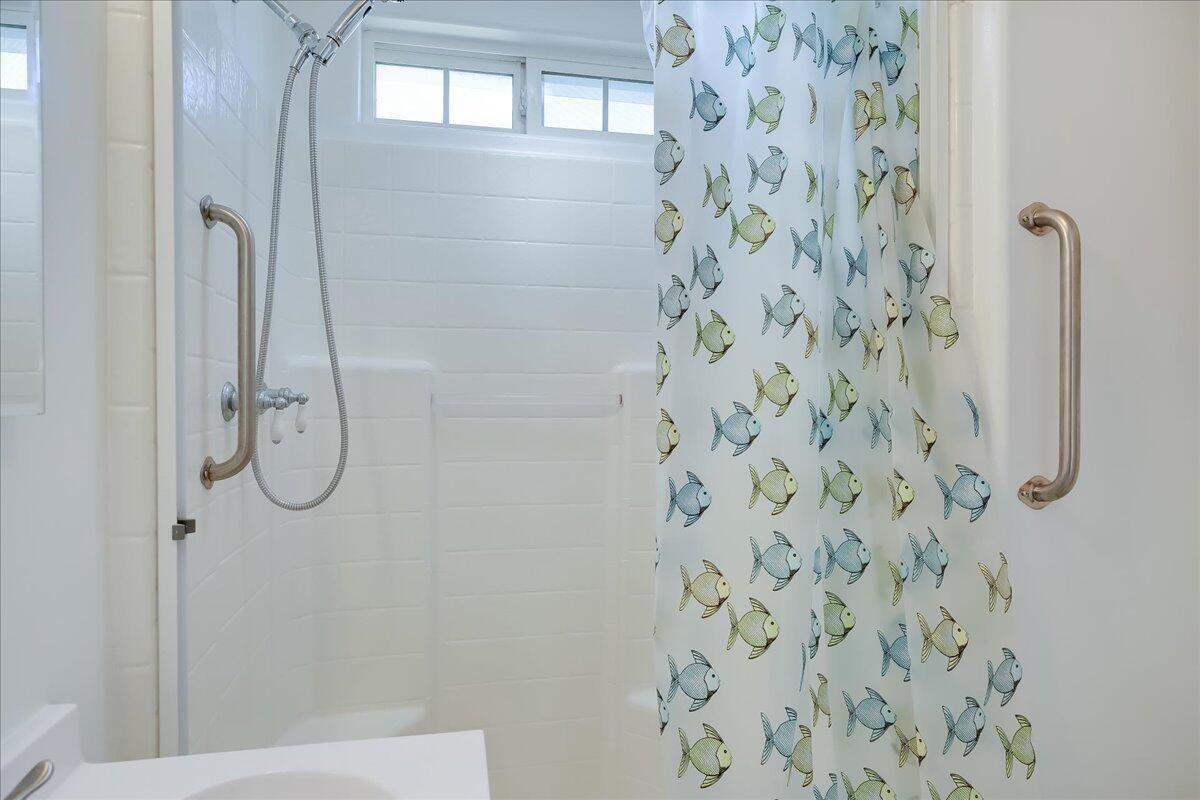 0 Mountain Avenue Santa Barbara, CA 93101 - Photo 22 of 24 a bathroom with a glass shower door