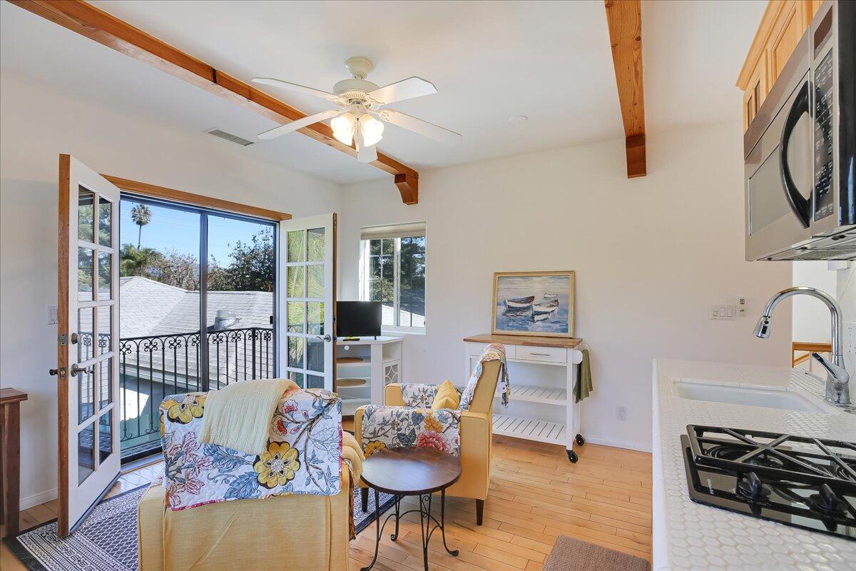 0 Mountain Avenue Santa Barbara, CA 93101 - Photo 3 of 24 a living room with furniture and a flat screen tv