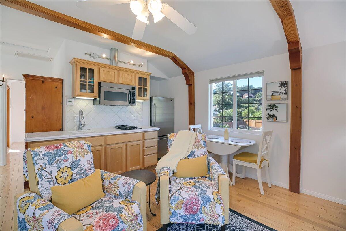 0 Mountain Avenue Santa Barbara, CA 93101 - Photo 6 of 24 a dining room with furniture and wooden floor