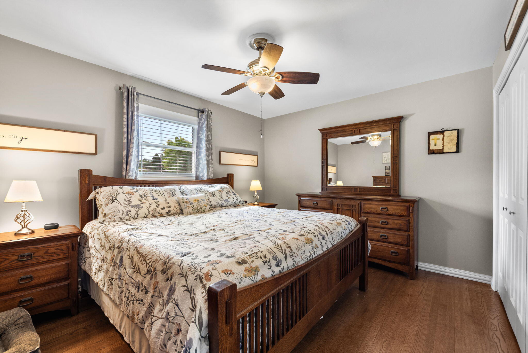 9835 Arthur Court Crown Point, IN 46307 - Photo 11 of 27 a bedroom with a bed and dresser with mirror