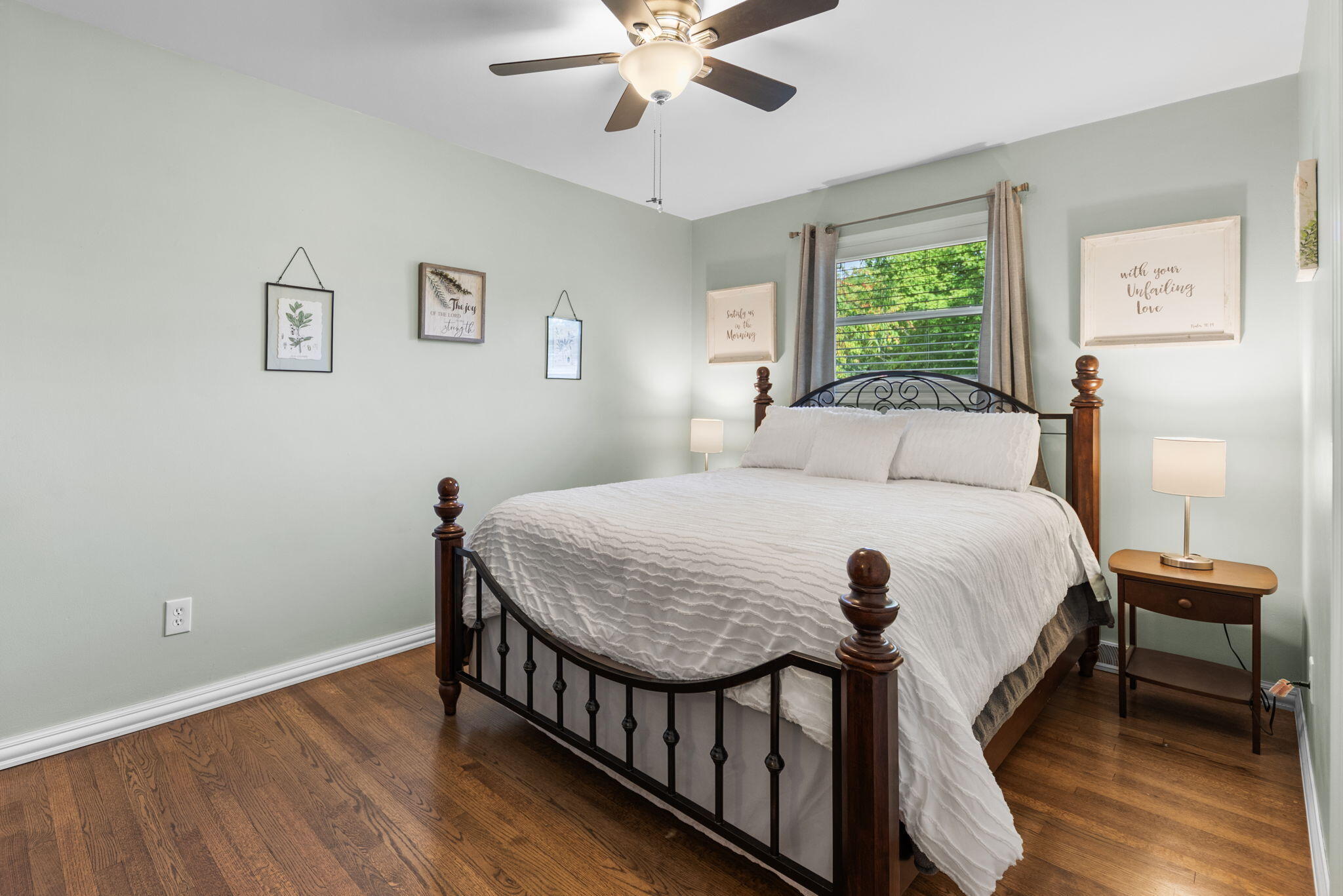 9835 Arthur Court Crown Point, IN 46307 - Photo 12 of 27 a bedroom with a bed and a window