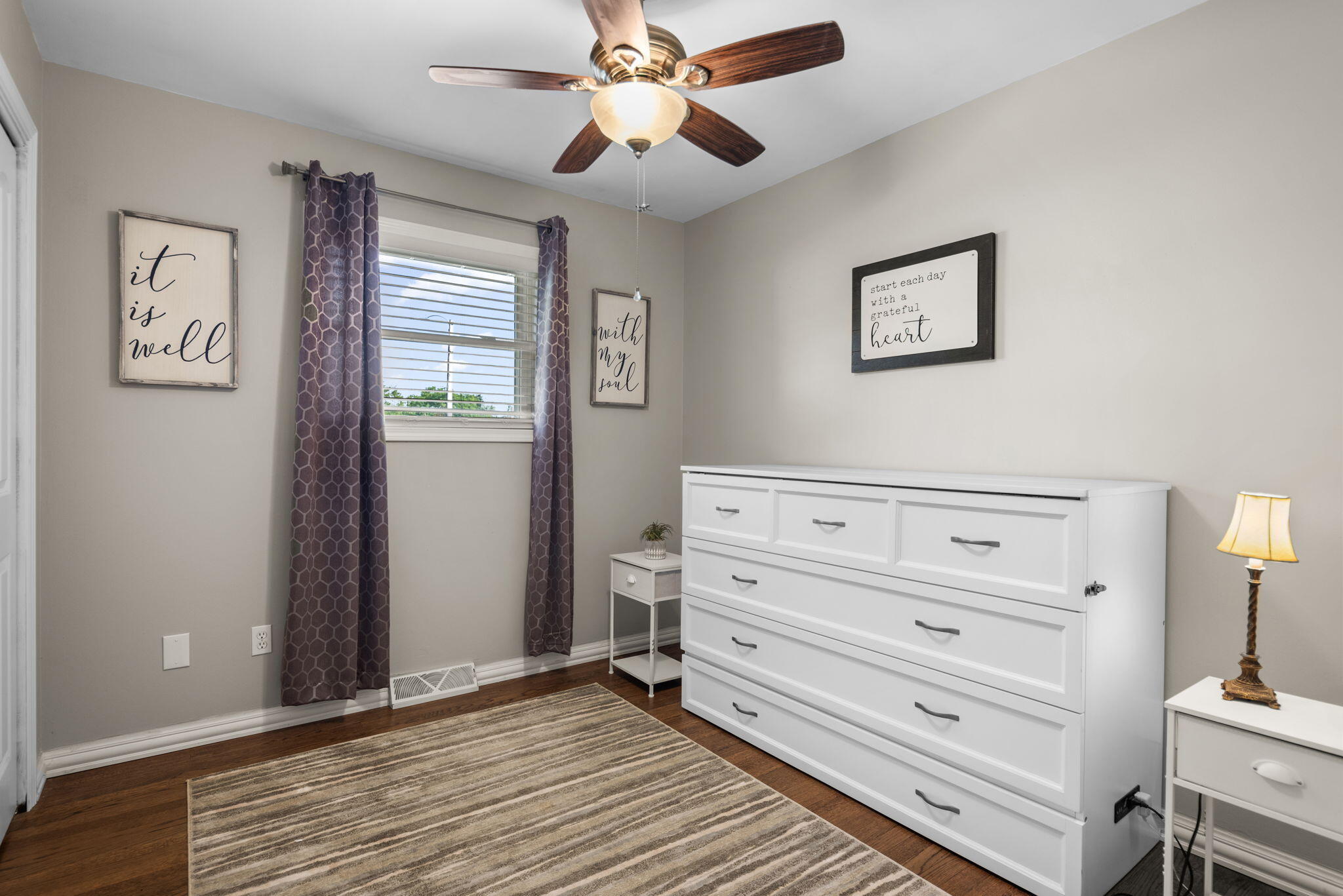 9835 Arthur Court Crown Point, IN 46307 - Photo 13 of 27 a view of room with cabinet and ceiling fan