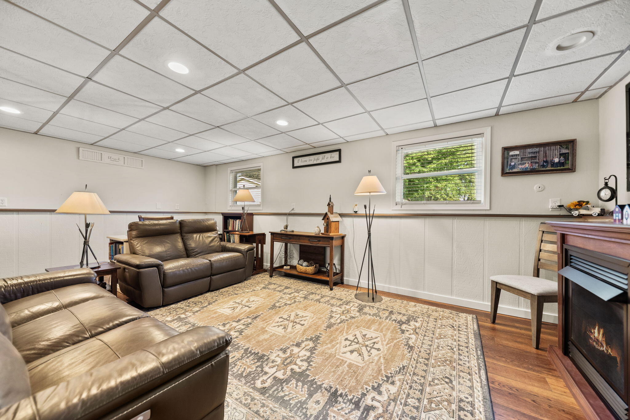 9835 Arthur Court Crown Point, IN 46307 - Photo 15 of 27 a living room with furniture and a fireplace