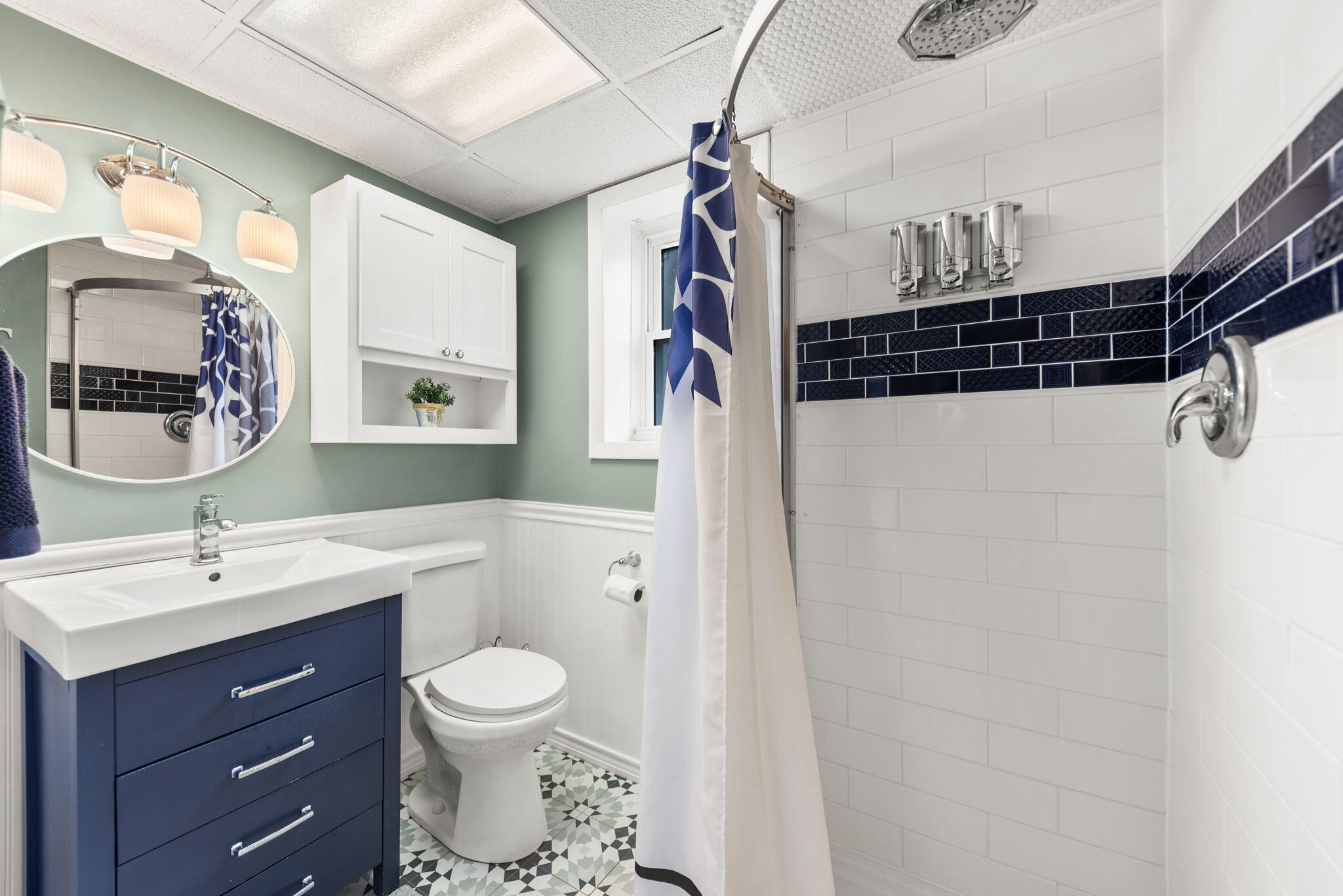 9835 Arthur Court Crown Point, IN 46307 - Photo 20 of 27 a bathroom with a sink toilet a mirror and shower