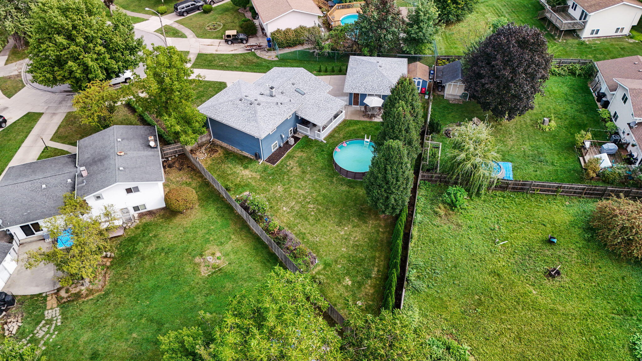 9835 Arthur Court Crown Point, IN 46307 - Photo 25 of 27 an aerial view of residential house with outdoor space and trees all around