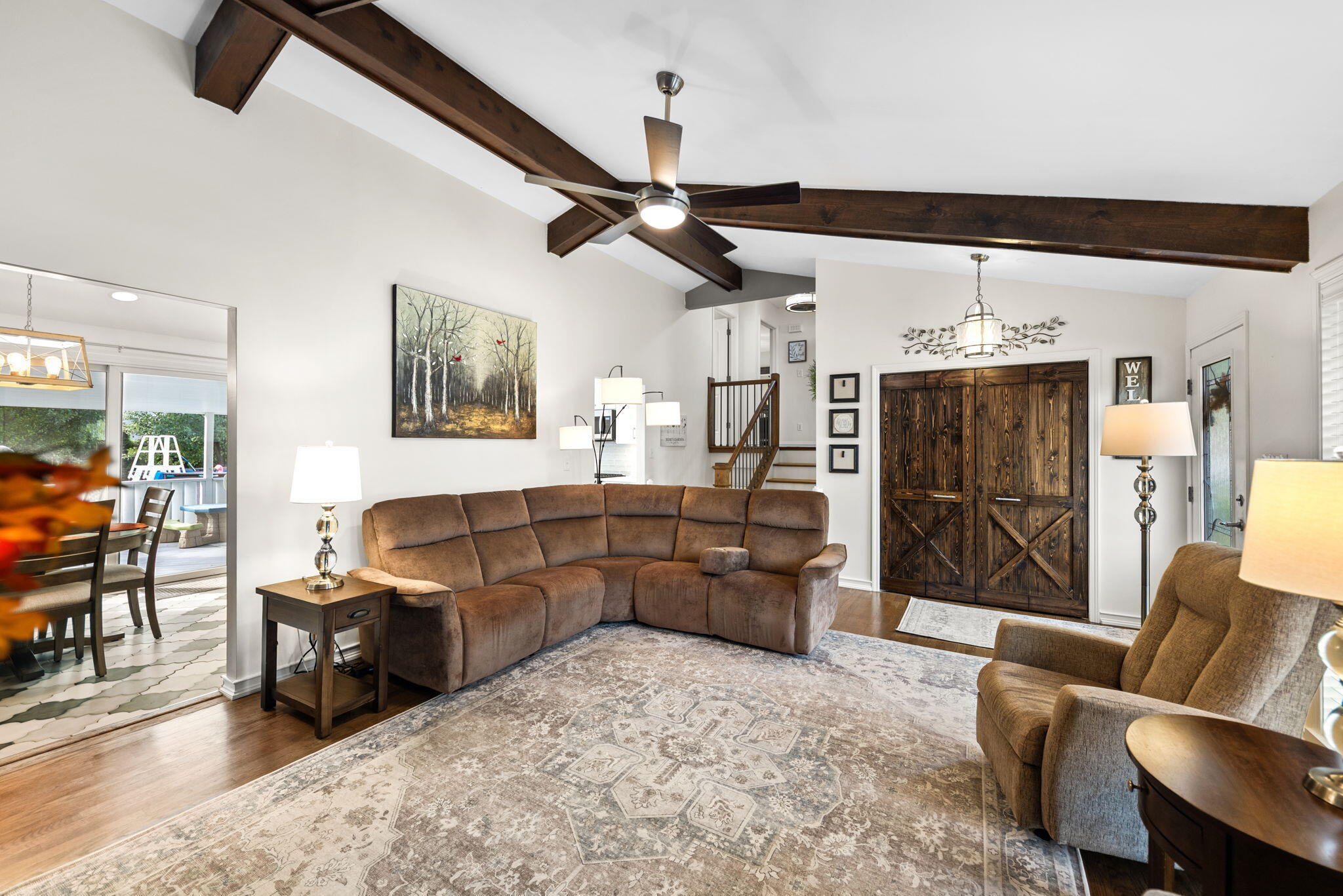 9835 Arthur Court Crown Point, IN 46307 - Photo 4 of 27 a living room with furniture and a ceiling fan