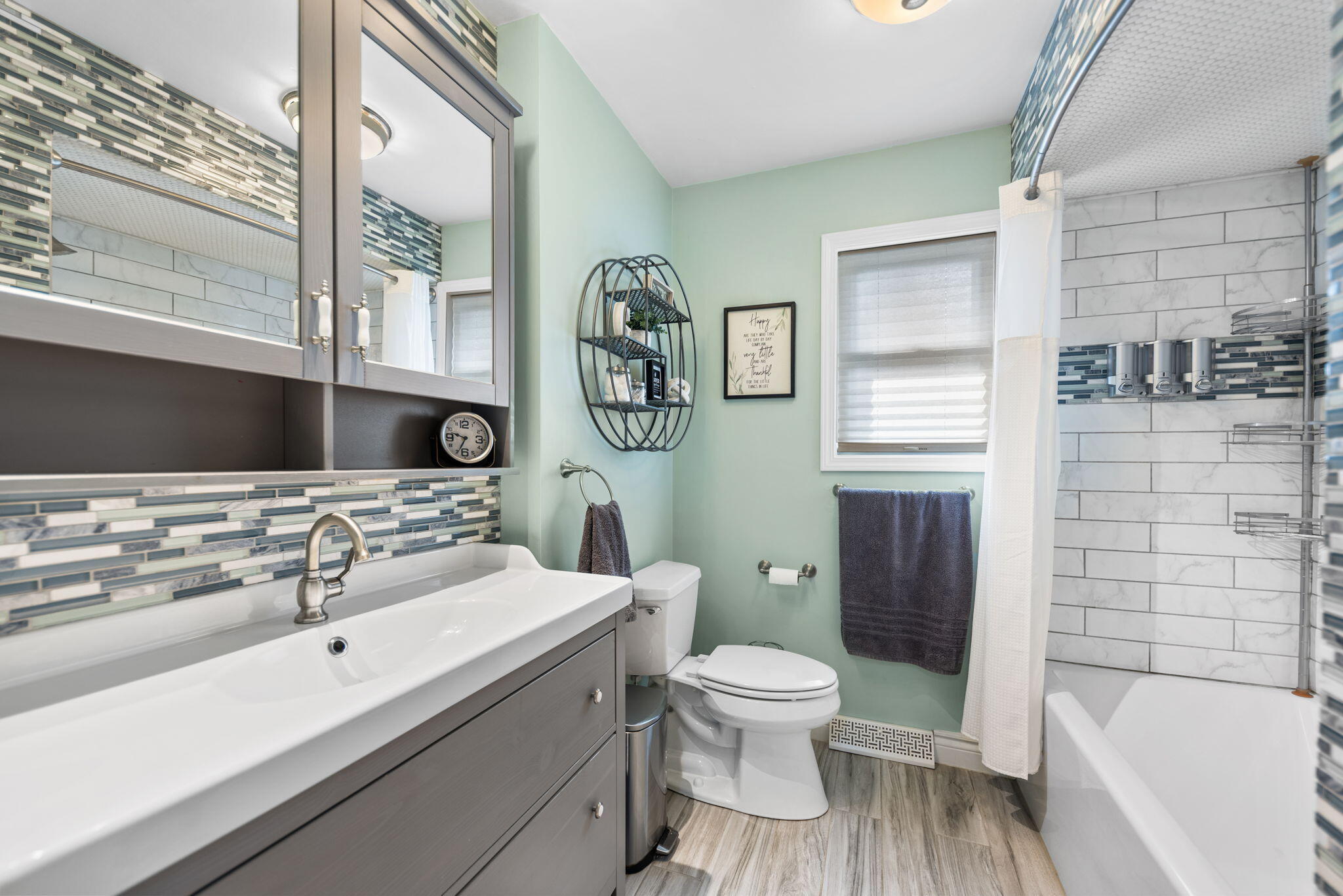 9835 Arthur Court Crown Point, IN 46307 - Photo 10 of 27 a bathroom with a sink a toilet and shower