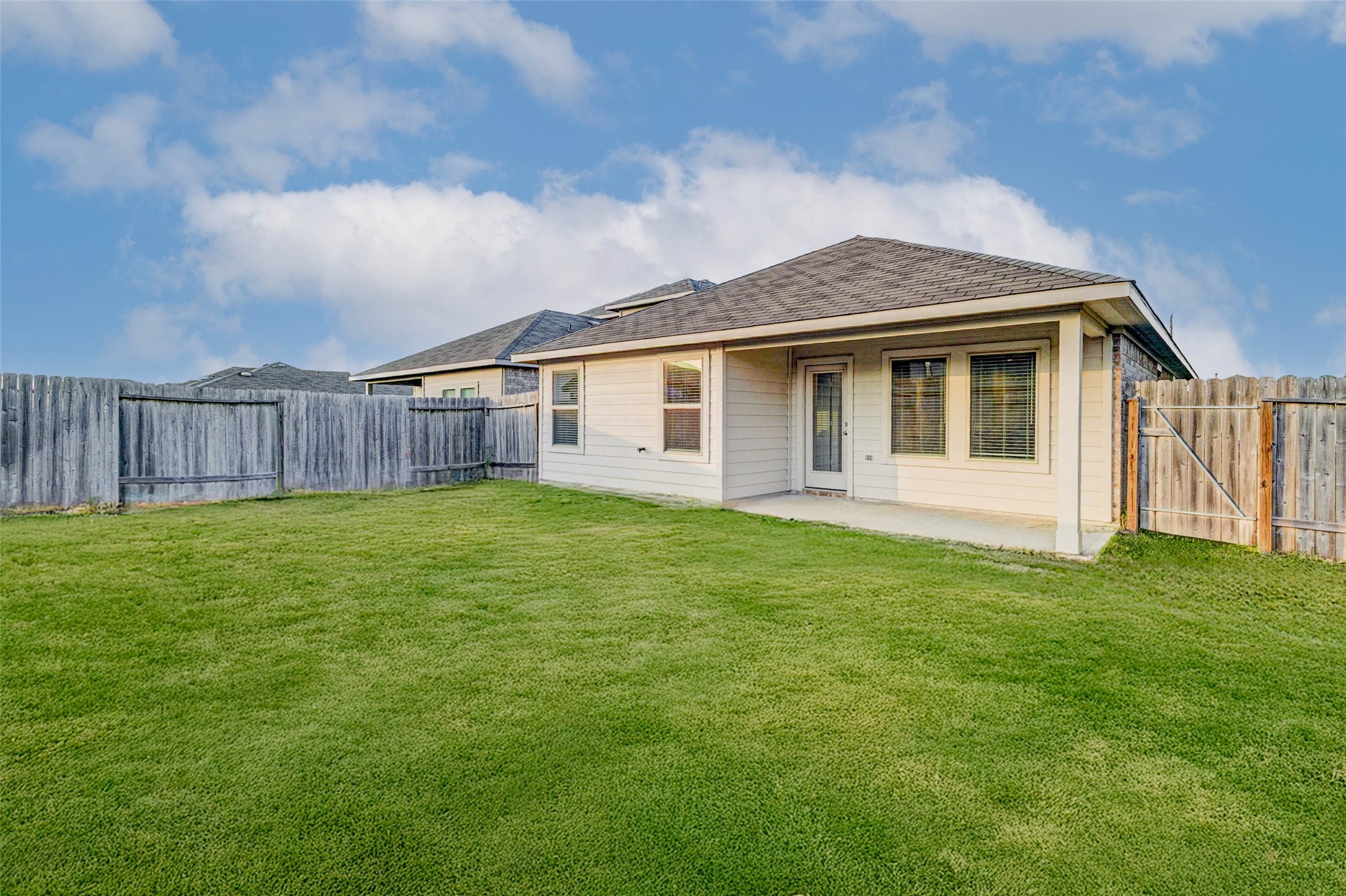 23135 Barrington Bluff Trail Spring, TX 77373 - Photo 14 of 15 a view of a house with backyard and garden