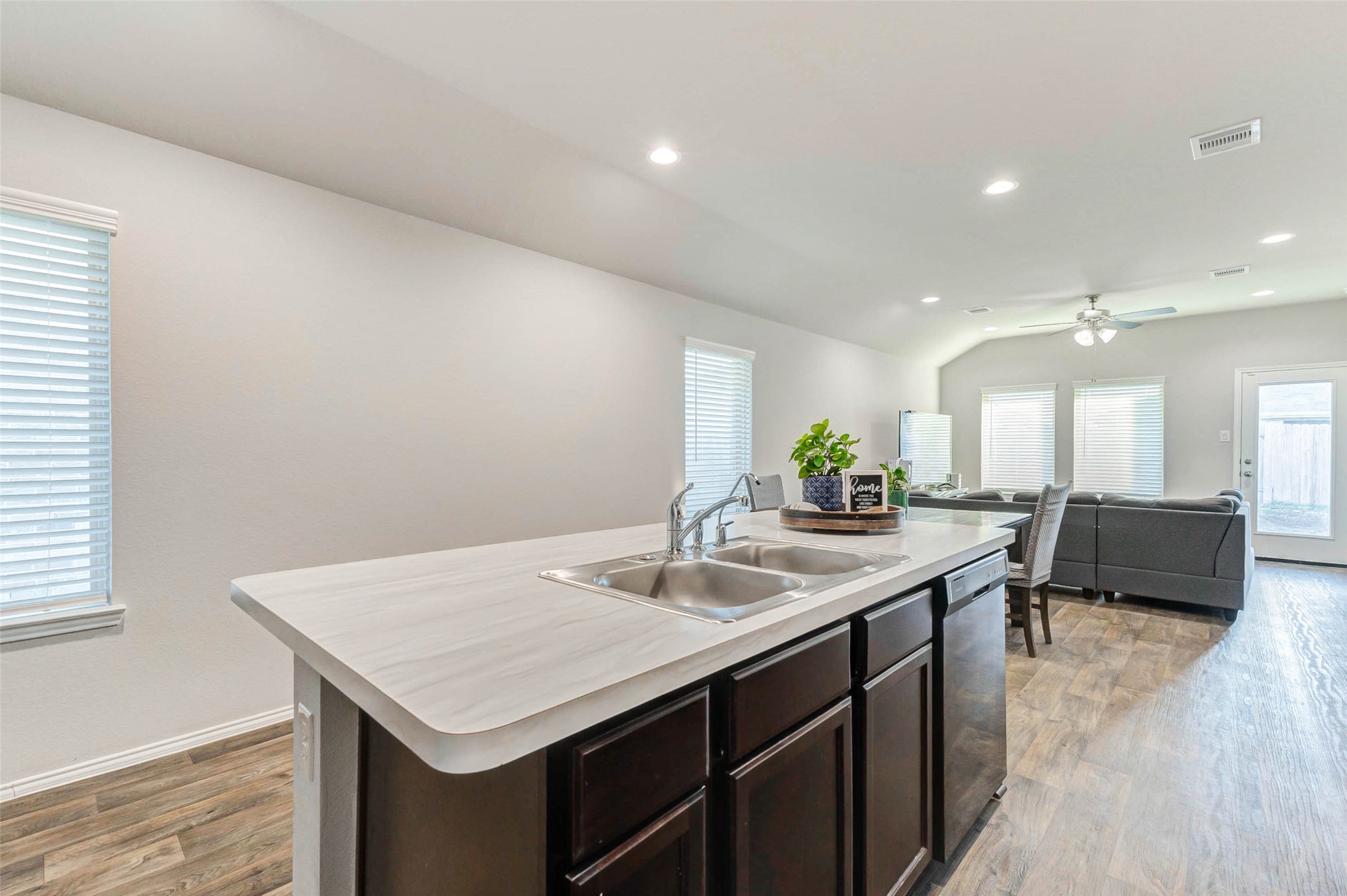 23135 Barrington Bluff Trail Spring, TX 77373 - Photo 7 of 15 a kitchen with a stove a counter space and a sink