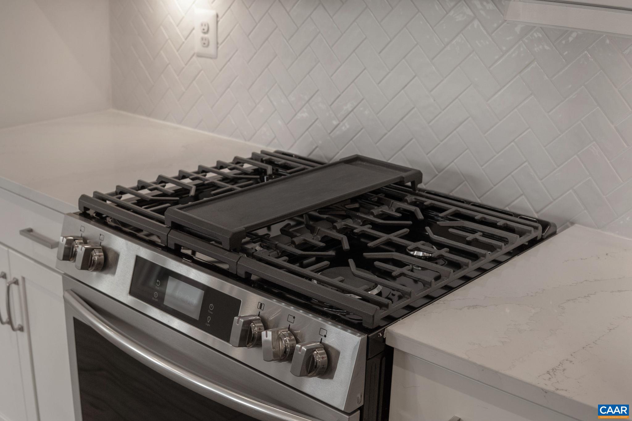 201 Ridgeline Drive Waynesboro, VA 22980 - Photo 12 of 45 an outdoor stove sitting inside of a kitchen