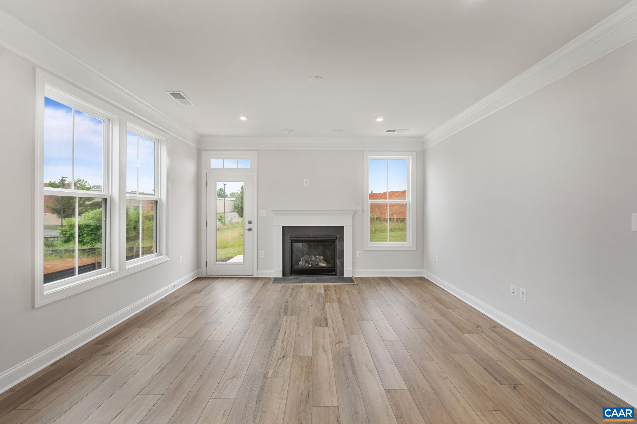201 Ridgeline Drive Waynesboro, VA 22980 - Photo 19 of 45 a view of an empty room with a window and wooden floor