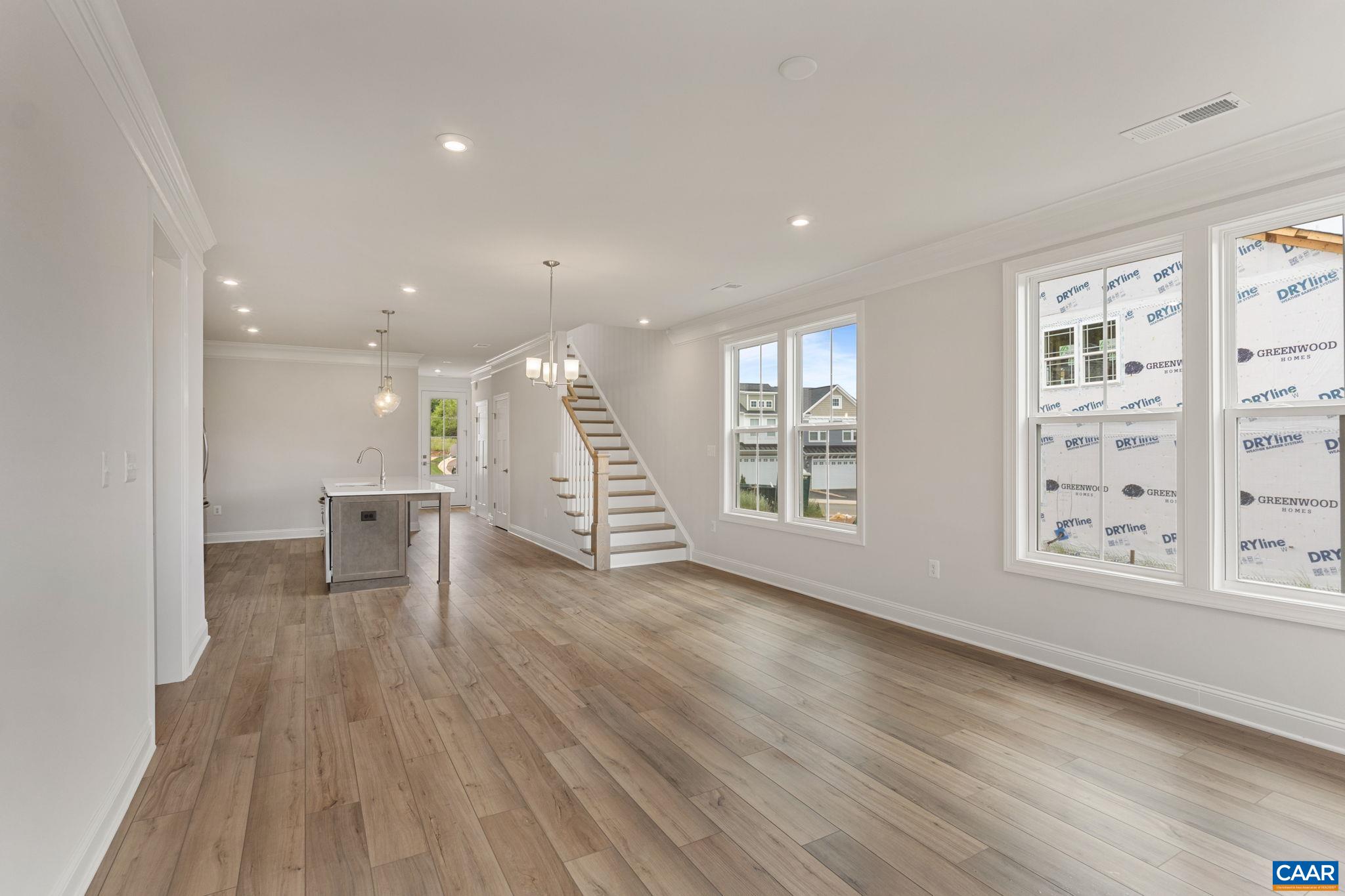 201 Ridgeline Drive Waynesboro, VA 22980 - Photo 21 of 45 an empty room with wooden floor and windows