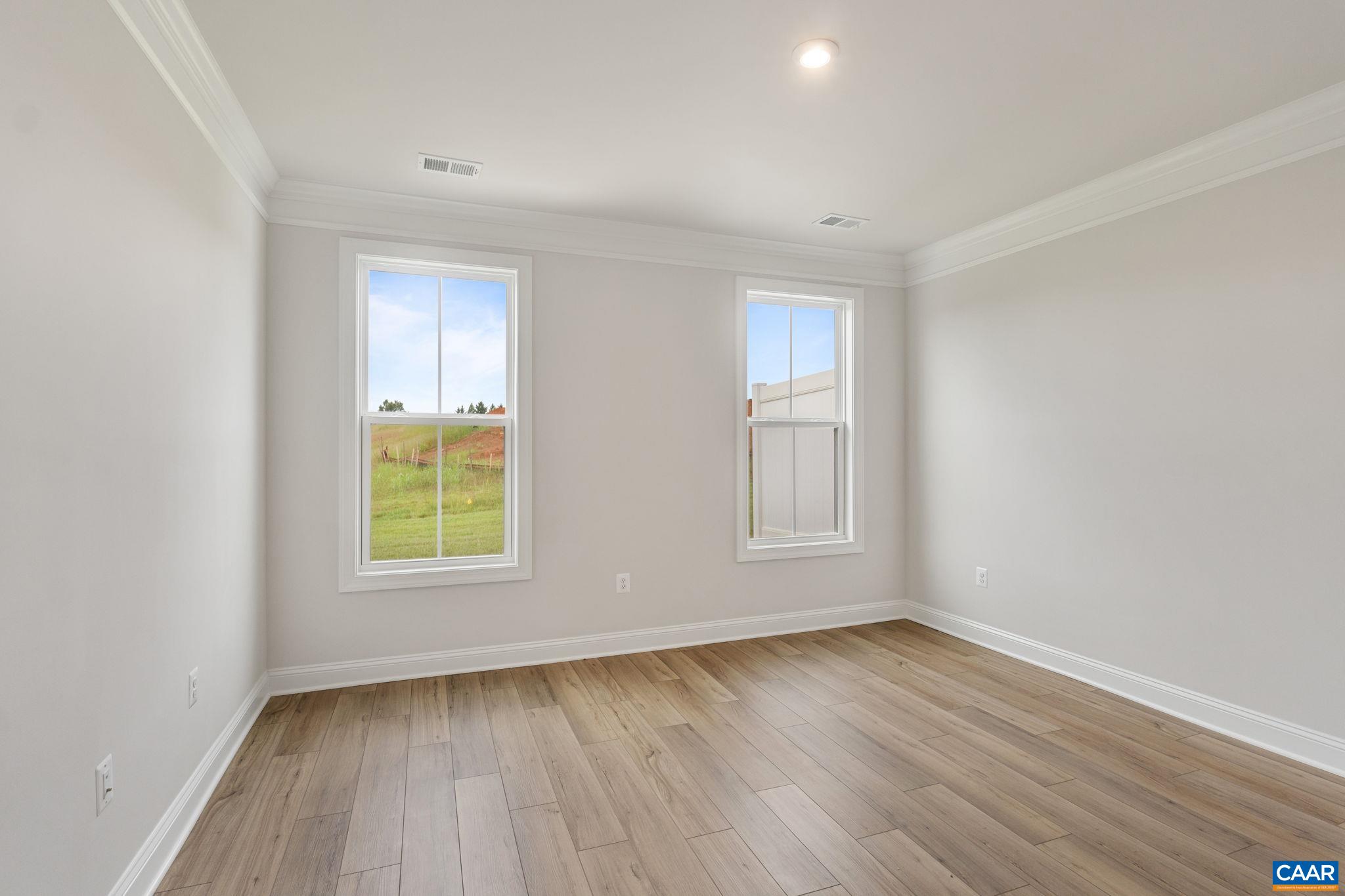 201 Ridgeline Drive Waynesboro, VA 22980 - Photo 25 of 45 an empty room with wooden floor and window