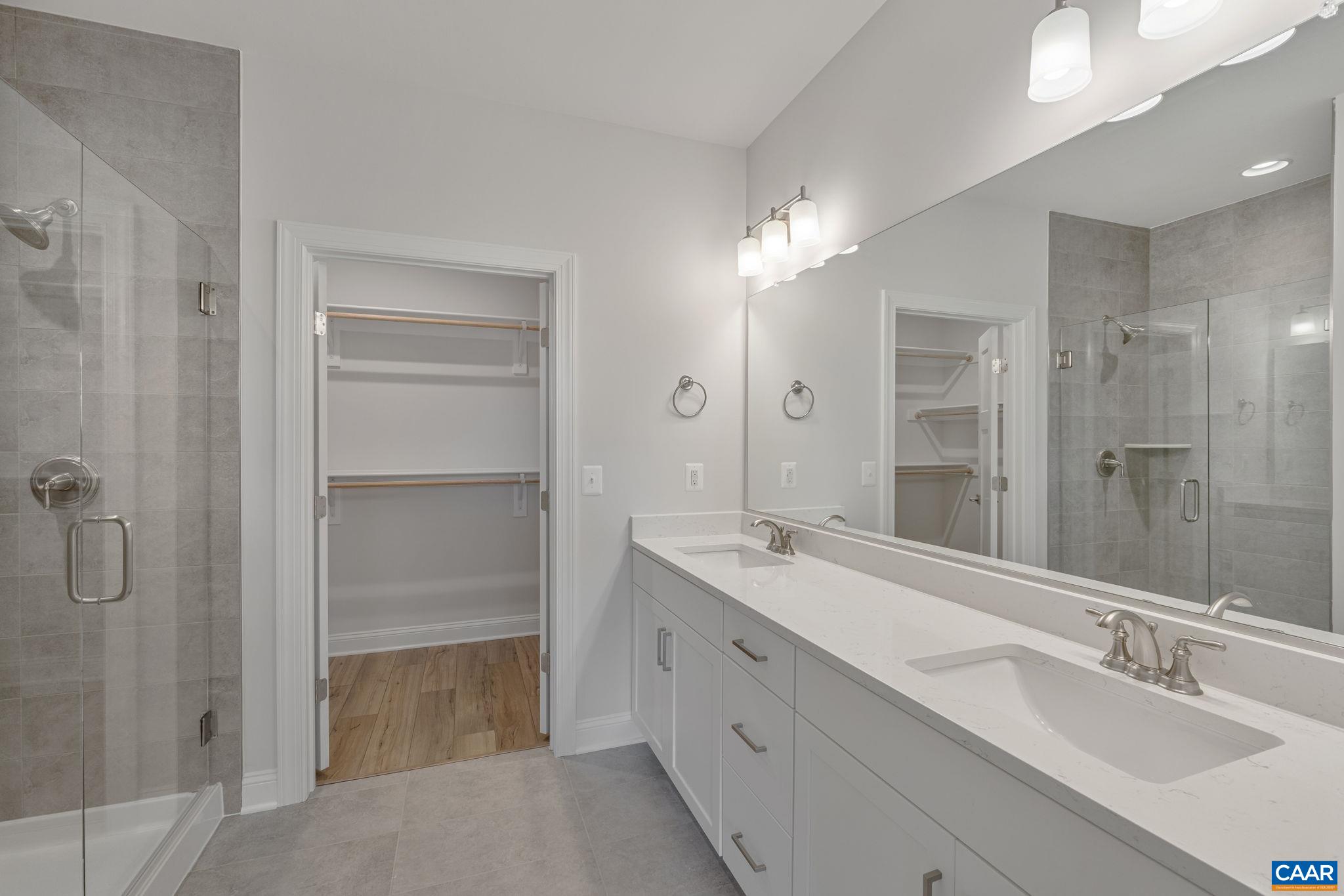 201 Ridgeline Drive Waynesboro, VA 22980 - Photo 27 of 45 a bathroom with a double vanity sink shower and a mirror