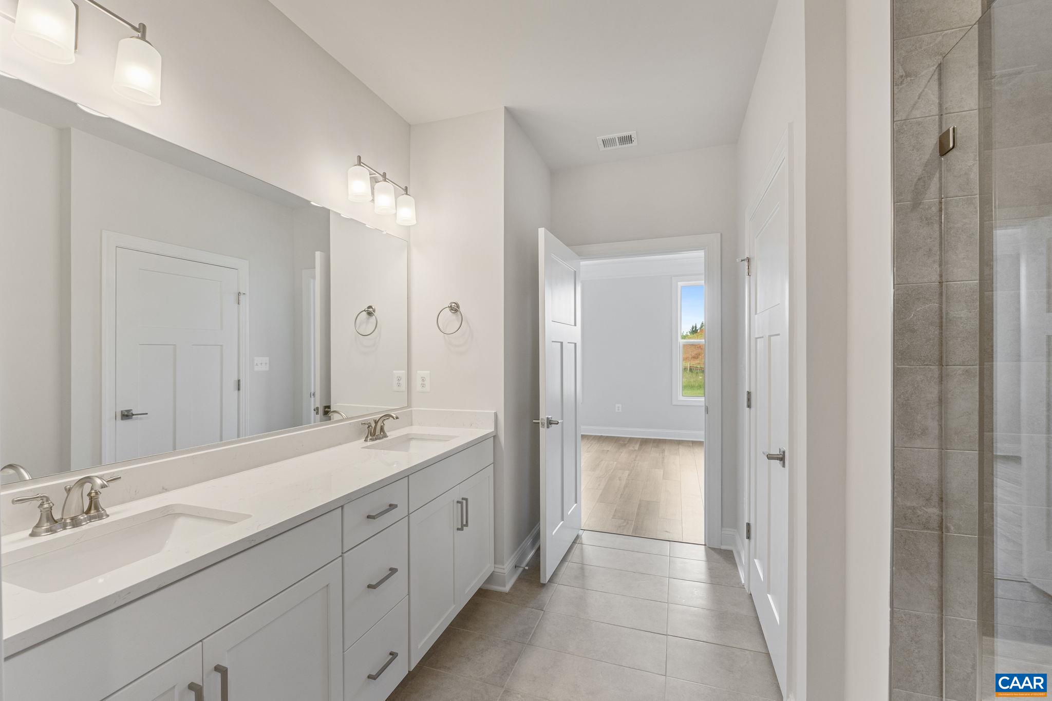 201 Ridgeline Drive Waynesboro, VA 22980 - Photo 29 of 45 a spacious bathroom with a double vanity sink mirror and