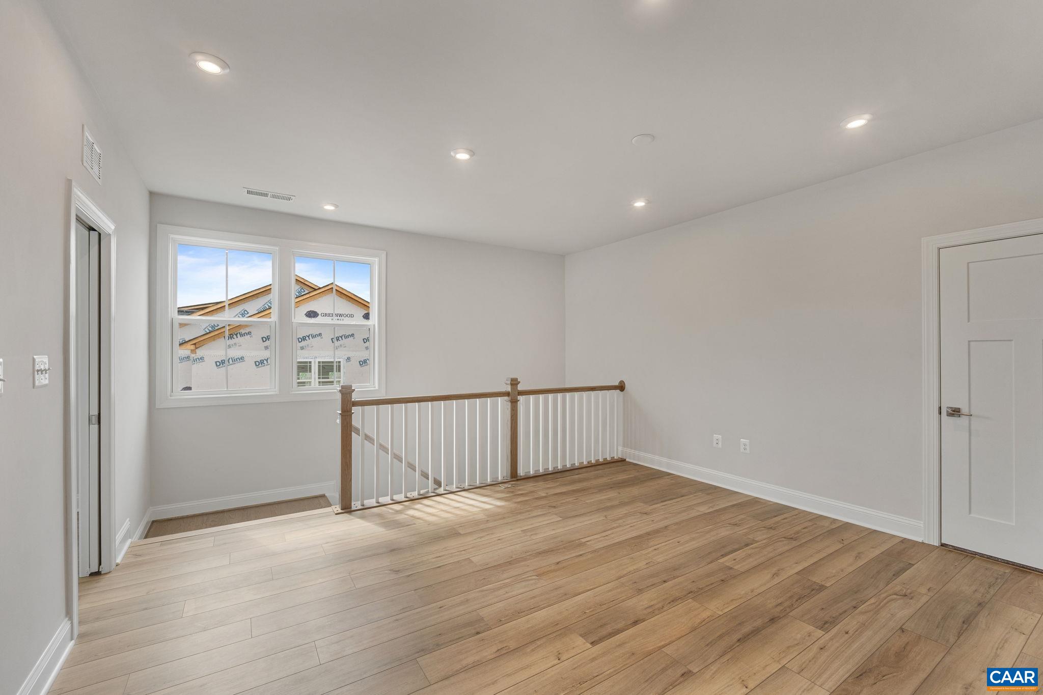 201 Ridgeline Drive Waynesboro, VA 22980 - Photo 39 of 45 wooden floor in an empty room with a window