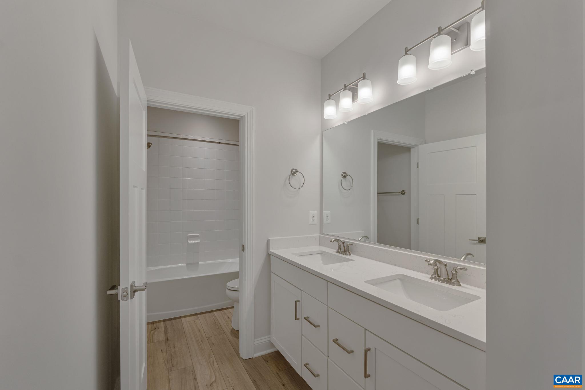 201 Ridgeline Drive Waynesboro, VA 22980 - Photo 42 of 45 a bathroom with a double vanity sink mirror and double