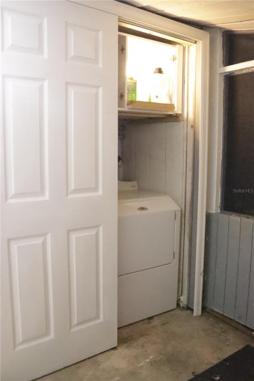 3856 South Sandpiper Terrace Homosassa, FL 34448 - Photo 12 of 27 a utility room with dryer and washer