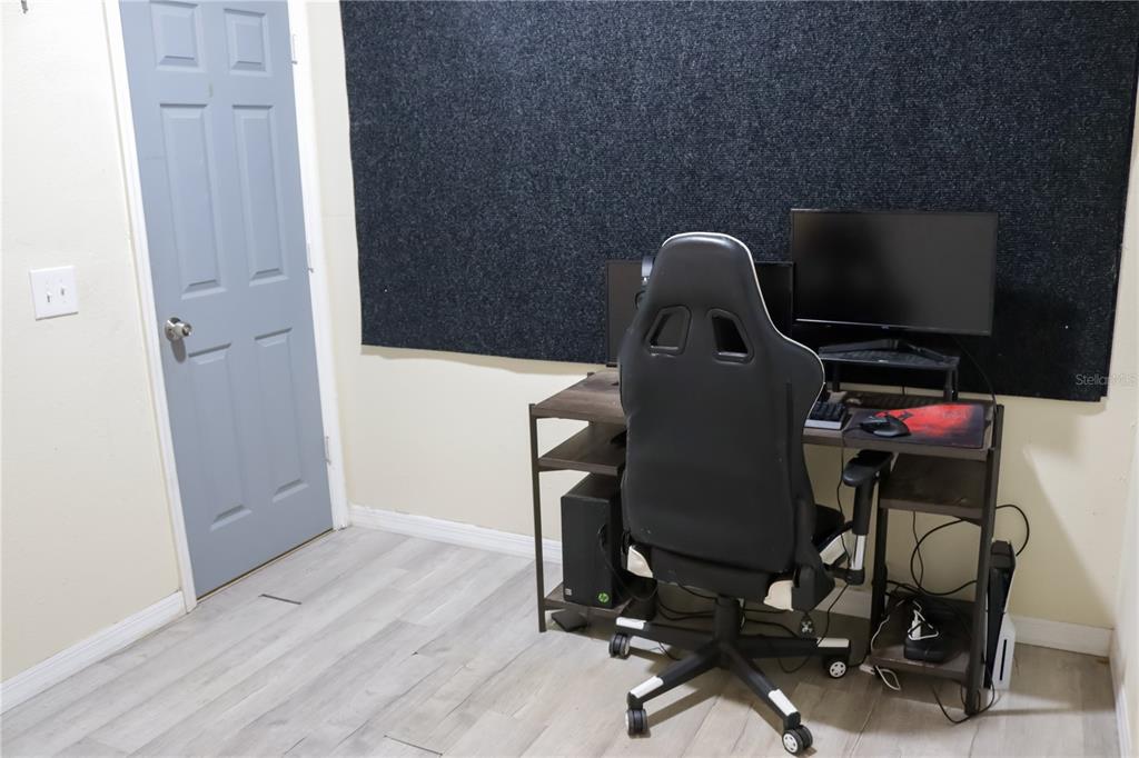 3856 South Sandpiper Terrace Homosassa, FL 34448 - Photo 20 of 27 a view of a workspace with furniture and a flat screen tv