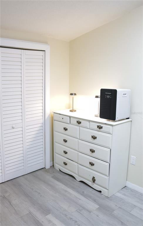 3856 South Sandpiper Terrace Homosassa, FL 34448 - Photo 21 of 27 a room with a dresser in it