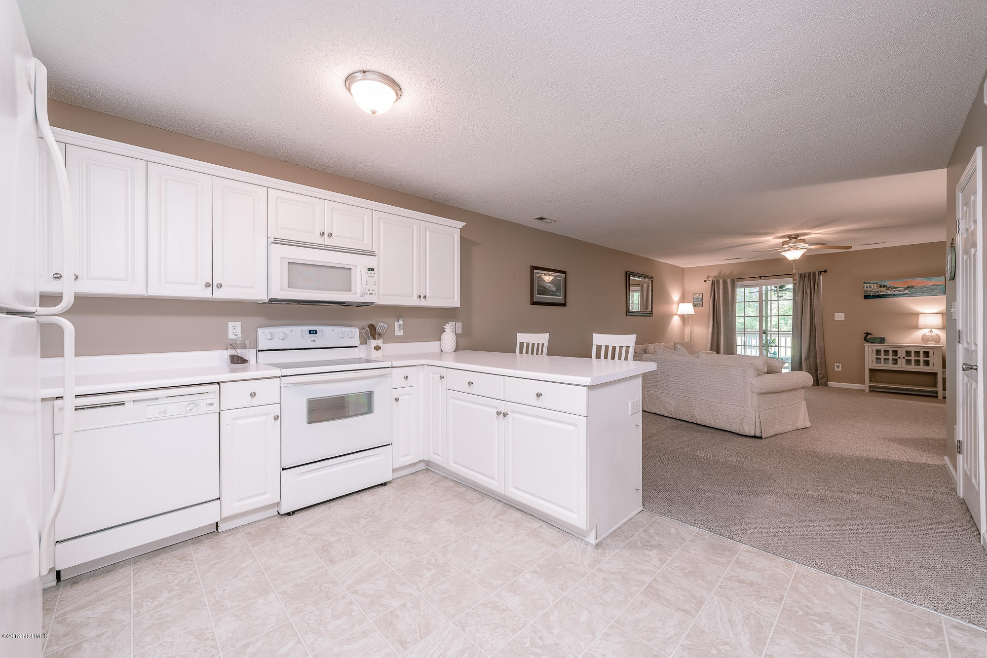 601 Peletier Loop Road, Unit I54 Swansboro, NC 28584 - Photo 6 of 13 Kitchen View from Front Entry