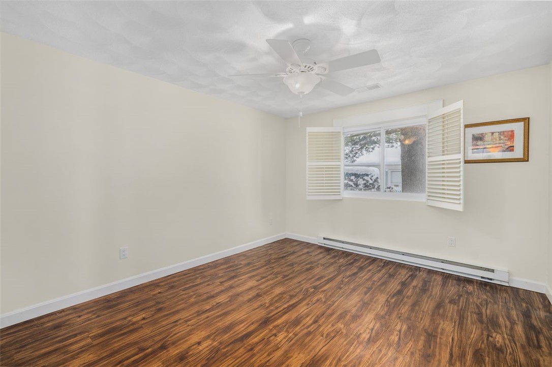 122 Edaville Court Warwick, RI 02886 - Photo 15 of 49 Primary bedroom with custom plantation shutters