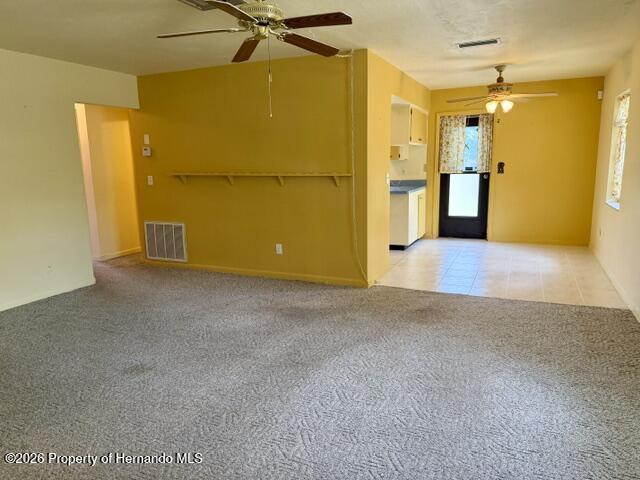 6848 Treehaven Drive Spring Hill, FL 34606 - Photo 6 of 34 Living room toward dining room