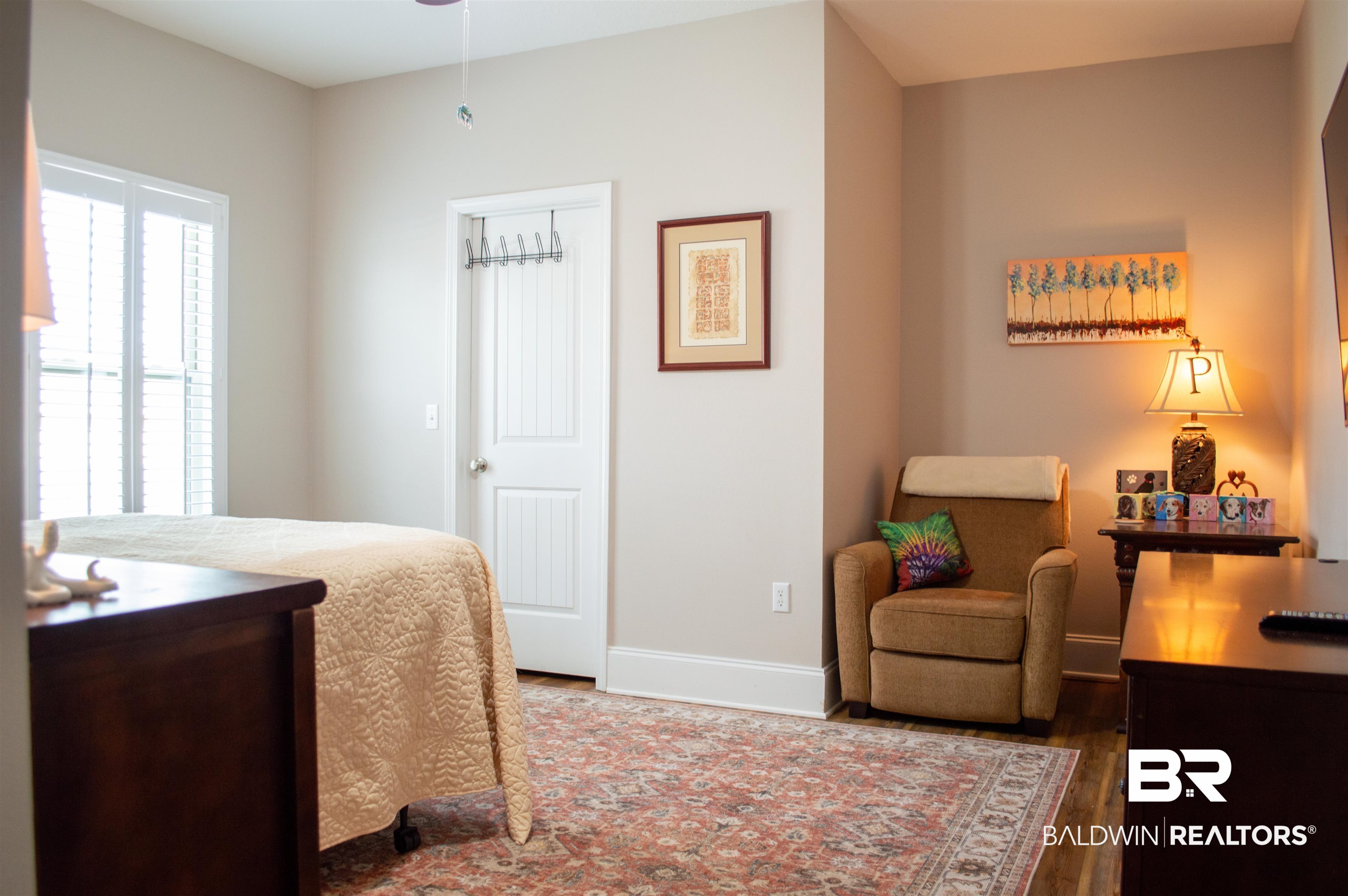 1124 West Orlando Drive Foley, AL 36535 - Photo 28 of 51 Bedroom featuring baseboards and wood finished floors
