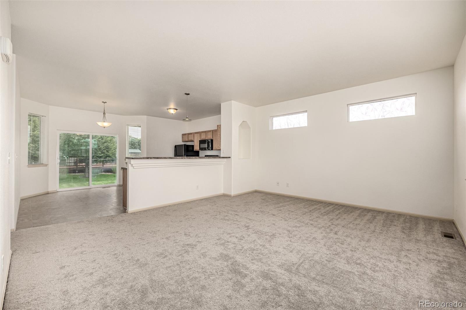 268 Naples Street Firestone, CO 80520 - Photo 5 of 34 a view of a kitchen with a sink