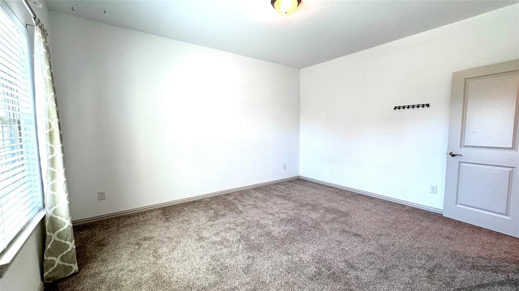 4683 B Rhett Lane Carrollton, TX 75010 - Photo 14 of 21 a view of an empty room