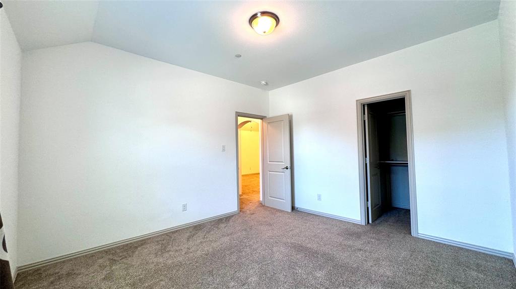4683 B Rhett Lane Carrollton, TX 75010 - Photo 17 of 21 a view of an empty room