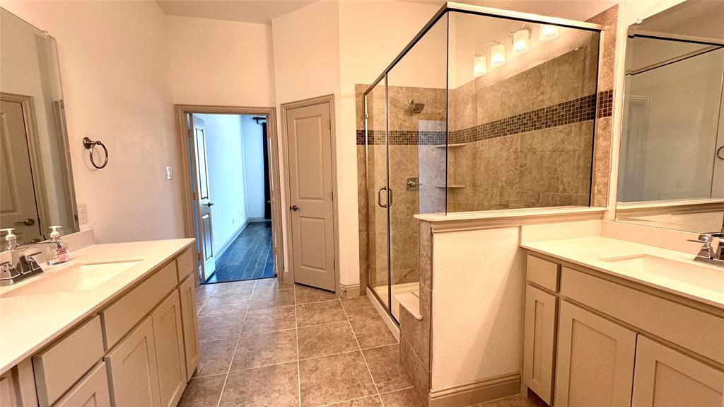 4683 B Rhett Lane Carrollton, TX 75010 - Photo 8 of 21 a bathroom with a sink and a tub