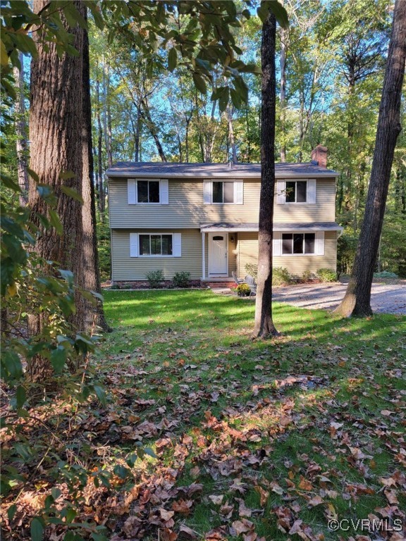 a house view with garden space
