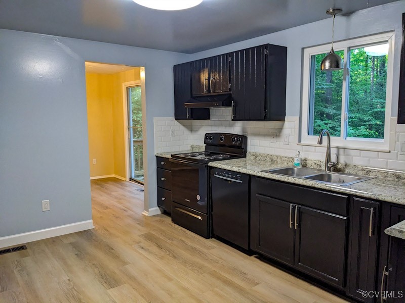 4600 Painted Post Lane Midlothian, VA 23112 - Photo 19 of 50 a kitchen with granite countertop wooden cabinets and a sink