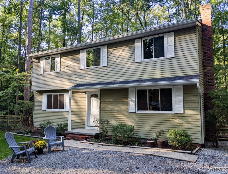 4600 Painted Post Lane Midlothian, VA 23112 - Photo 2 of 50 a view of a house with a yard and sitting area