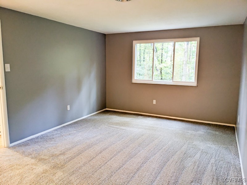 4600 Painted Post Lane Midlothian, VA 23112 - Photo 28 of 50 an empty room with wooden floor and windows