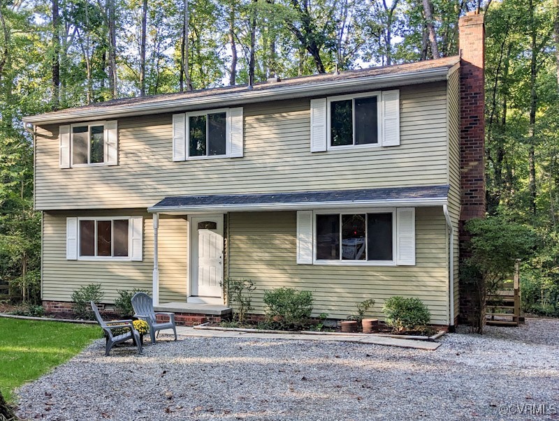 4600 Painted Post Lane Midlothian, VA 23112 - Photo 4 of 50 a backyard of a house with yard table and chairs