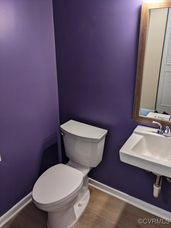 4600 Painted Post Lane Midlothian, VA 23112 - Photo 7 of 50 a white toilet sitting next to a bathroom sink