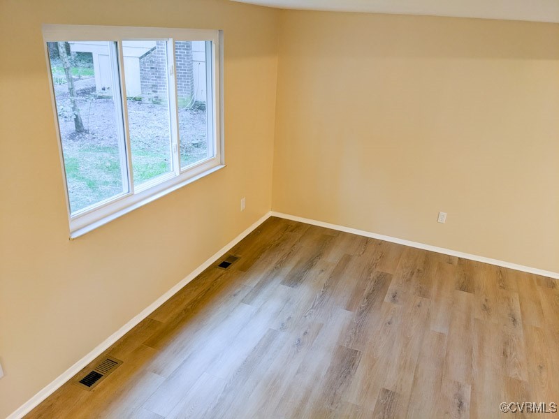 4600 Painted Post Lane Midlothian, VA 23112 - Photo 10 of 50 a view of a room with wooden floor and a window