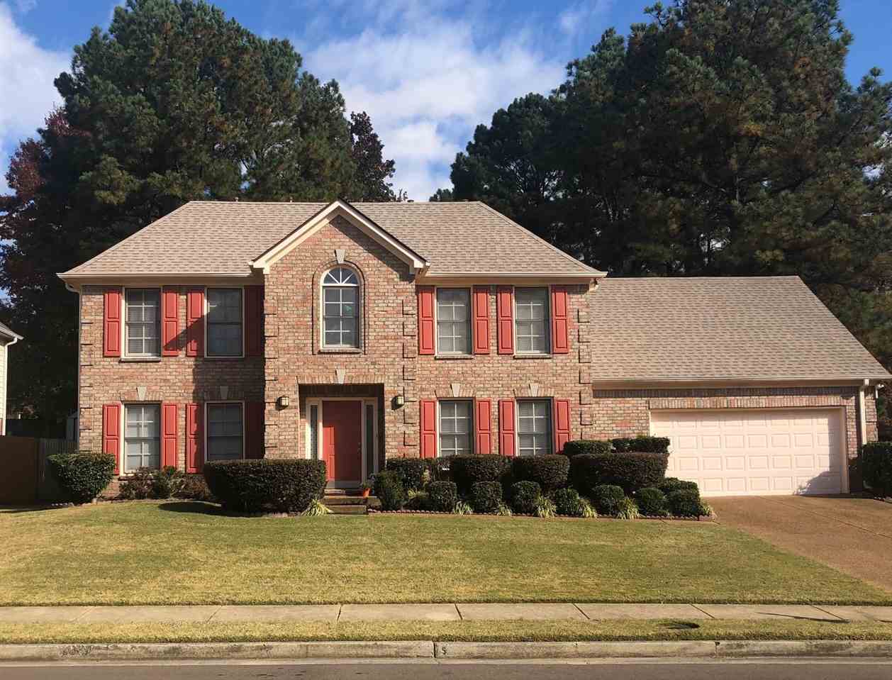 9114 Raspberry Lane Cordova, TN 38016 - Photo 1 of 22 a front view of a house with a yard