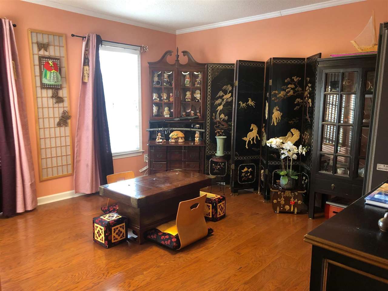 9114 Raspberry Lane Cordova, TN 38016 - Photo 6 of 22 a room with gym equipment and a large window