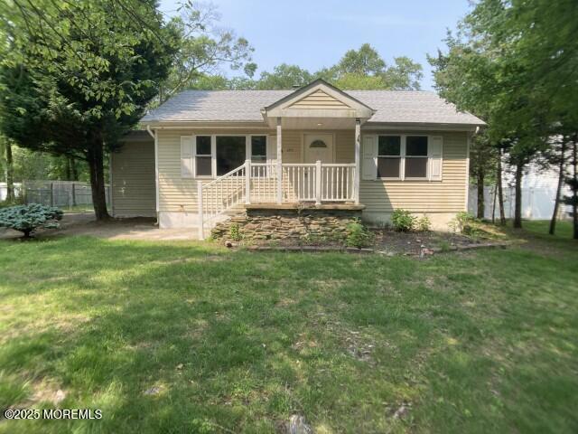 273 Stuart Street Howell, NJ 07731 - Photo 1 of 18 a front view of a house with a yard