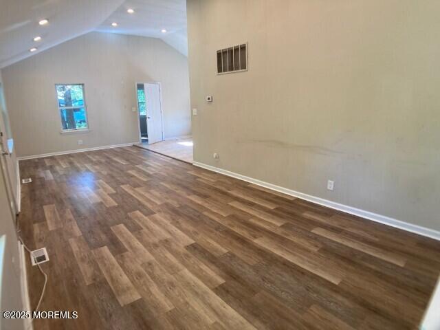 273 Stuart Street Howell, NJ 07731 - Photo 13 of 18 an empty room with wooden floor and windows