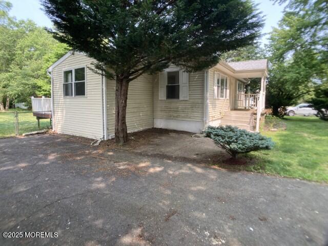 273 Stuart Street Howell, NJ 07731 - Photo 18 of 18 a front view of a house with a yard and garage