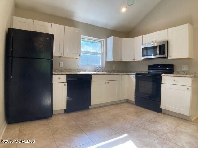 273 Stuart Street Howell, NJ 07731 - Photo 2 of 18 a kitchen with stainless steel appliances granite countertop a refrigerator and a stove top oven